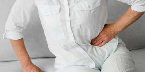 old-patient-sitting-couch_23-2148504527